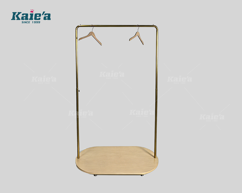 Brushed gold-colored stainless steel clothing display stand