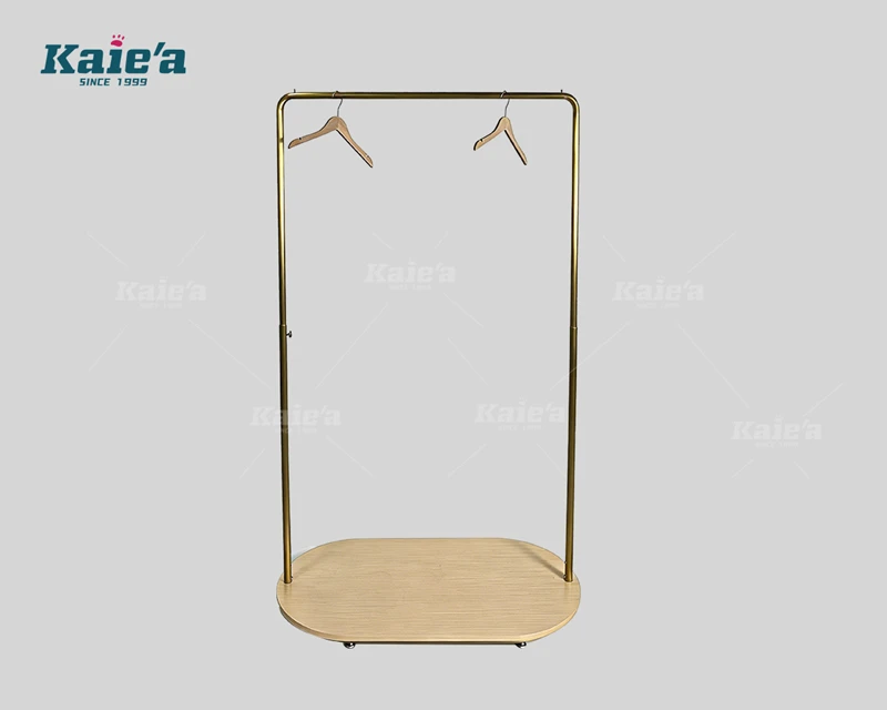 Brushed gold-colored stainless steel clothing display stand