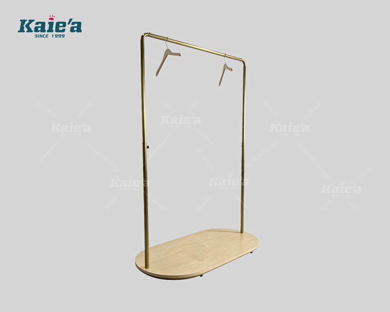 Brushed gold-colored stainless steel clothing display stand